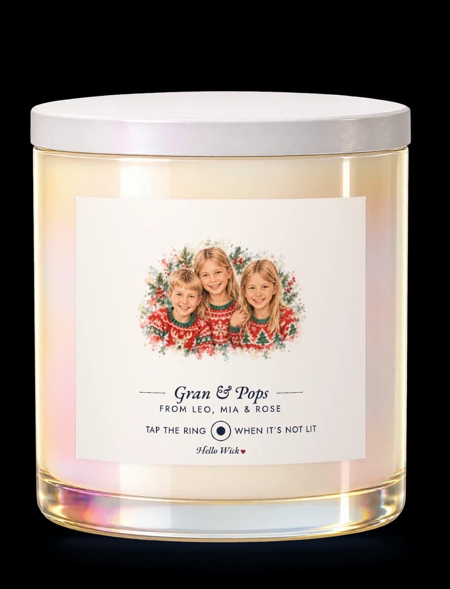 A Hello Wick candle labelled Gran & Pops, from Leo, Mia and Rose, with a watercolour of the three grandkids