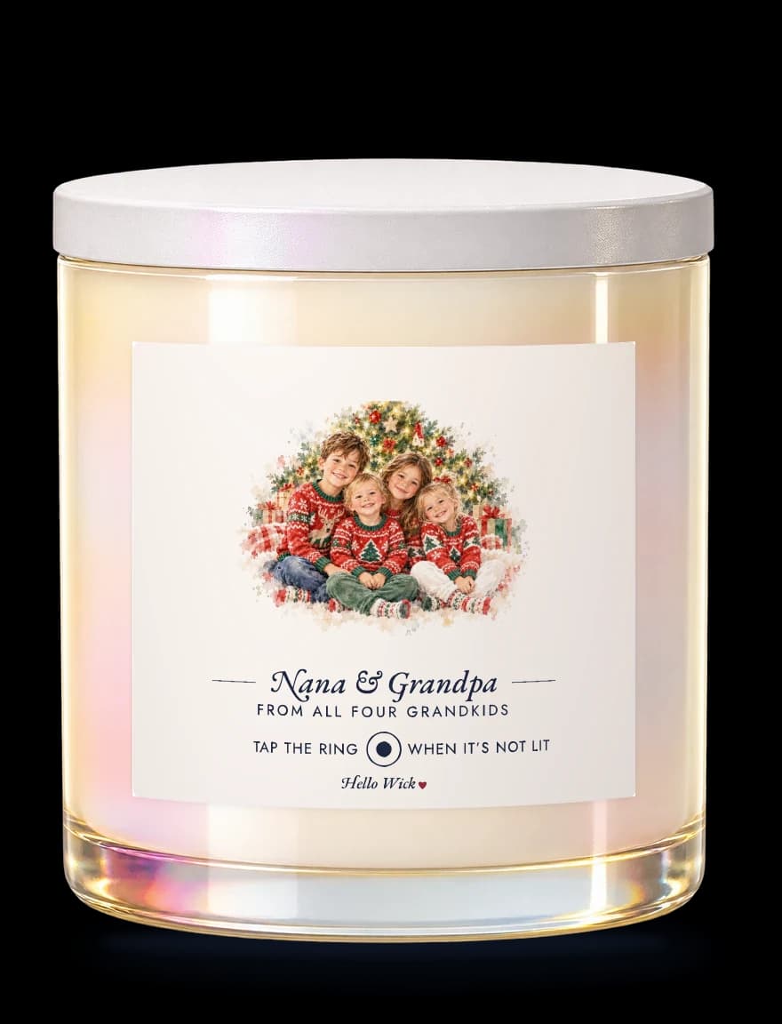 A Hello Wick candle labelled Nana & Grandpa, from all four grandkids, with a watercolour of the four grandkids
