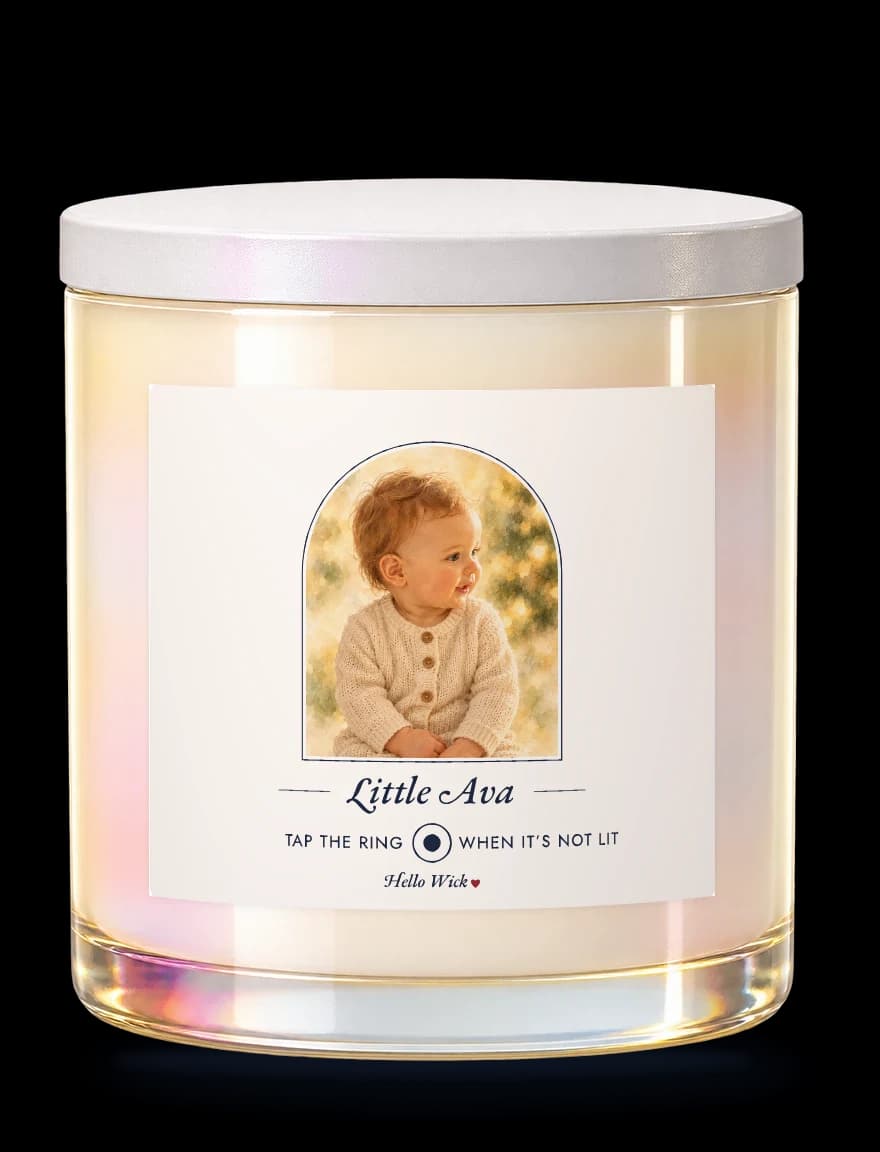 A Hello Wick candle labelled Little Ava, with a watercolour of the baby