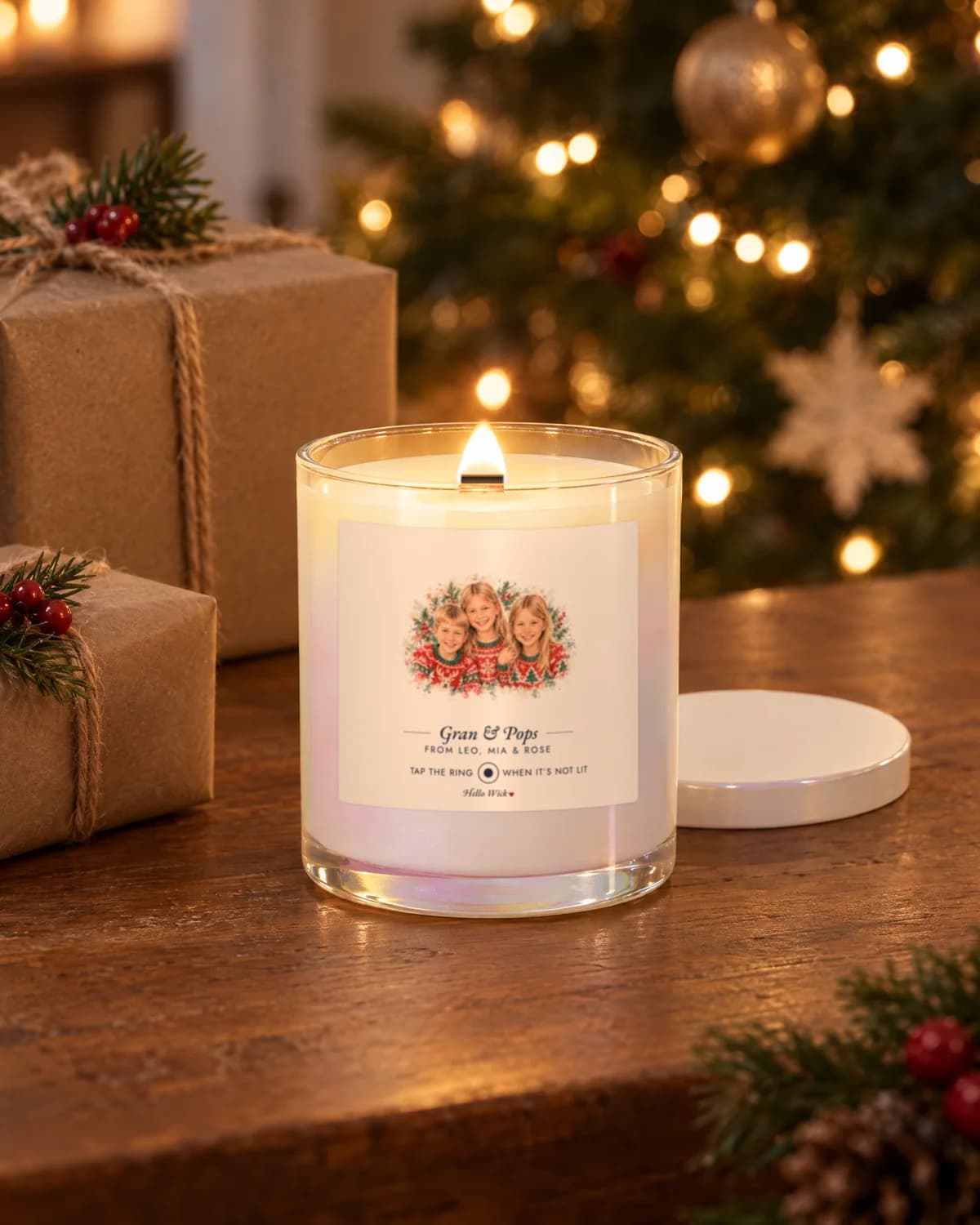 Placeholder photo: a lit Hello Wick candle labeled Gran & Pops under the Christmas tree